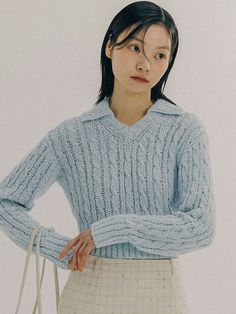 The long-sleeved knit sweater that mixed of two kinds of fabric with cable knitted pattern. Featuring the spread collar design, and wide ribbed hem that creates slim waistline. The collar detail and cropped length of the sweater make it easy to style casual looks. - Spread collar and long-sleeved design- Cable pattern throughout- Ribbed trim at collar, sleeves, and hem- Cropped length and slim silhouette- Casual and daily mood Knit Zip Up Sweater Pattern, Knit Zip Up Sweater, Sew Clothing, Daily Mood, Cable Pattern, Kinds Of Fabric, Collar Designs, Zip Up Sweater, Sweater Making