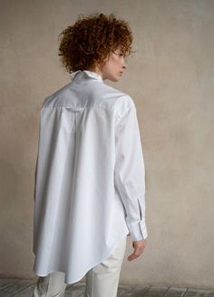 The white oversized button-down shirt Seconda is a timeless wardrobe essential that offers versatility, making it a perfect choice for any occasion. Whether it's a business meeting or a relaxing day, Seconda ensures your comfort with its organic cotton fabric and oversize design. This shirt offers a sense of sophistication and high-quality craftsmanship that you can truly feel when you wear it.Features: Italian design Premium 100% organic cotton satin Long lived garment The fabric is highly dura Oversized Button Down Shirt, Business Shirt, Shirt Blouses Women's, Cotton Crafts, Gifts For New Mums, Business Shirts, Pearl Jewellery Earrings, Relaxing Day, Organic Cotton Fabric