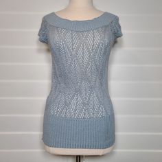 New With Tags Wet Seal Acrylic Cap Sleeve Boat Neck Sweater Blouse Size: L Color: Dusty Blue 100% Acrylic Style: 35866244 Made In Usa C-N-3 Blue Pointelle Knit Crew Neck Top, Elegant Stretch Light Blue Top, Elegant Light Blue Stretch Top, Light Blue Pointelle Knit Top, Casual Light Blue Pointelle Knit Top, Strapless Shirt, Boat Neck Sweater, Purple Leopard Print, Peasant Shirt