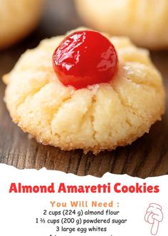 a close up of a cookie with a cherry on top and an ad for almond amarettii cookies