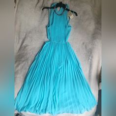 Michael Kors Halter Neck Pleated Cut-Out Midi Dress Size M & L Turquoise Bnwt Chic Turquoise Maxi Dress For Spring, Chic Flowy Turquoise Dresses, Summer Cocktail Dress In Turquoise, Turquoise Summer Cocktail Dress, Elegant Sleeveless Midi Dress In Turquoise, Elegant Sleeveless Turquoise Midi Dress, Elegant Turquoise Sleeveless Midi Dress, Turquoise Fitted Maxi Dress For Spring, Fitted Blue Pleated Maxi Dress