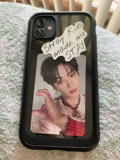 a cell phone case with an image of a woman holding her hand up to the camera