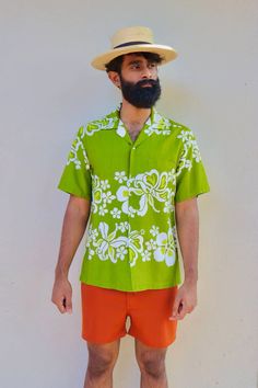 Party into the retro vibe of this true vintage 1960s to 1970s button down. A must have for anyone who values the past, yet lives for the fashion of the present. This amazing shirt has lasted the test of time & is waiting to make its debut into the world of luaus yet again Note: these pictures were taken in bright sunlight, the color is more closer to the pictures that appear in shade.  Condition: Very Good Brand: HAWAIIAN tags Color: Green & White  Men's Size: M Women's: S/M/L/XL depending on desire Aura: 1980s to 1990s Mood: Beach Tags: VINTAGE * ABSTRACT * 80S TO 90S * BUTTON UP * COLLARED SHIRT * SUMMER BEACH VIBE * HAWAIIAN * T-SHIRT * DRESS UP SHIRT * RETRO MENS * Cheap Vintage Multicolor Hawaiian Shirt, Green Fitted Shirt For Beach, Traditional Green Shirt For Spring, Vintage Green Cotton Hawaiian Shirt, Vintage White Hawaiian Shirt For Beach, Retro Cotton Hawaiian Shirt With Vintage Print, Vintage Hawaiian Shirt With Vintage Print For Vacation, Retro Printed Camp Shirt For Spring, Vintage Beach Shirt For Spring