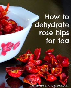 how to dehydraate rose hips for tea with red flowers in a white bowl