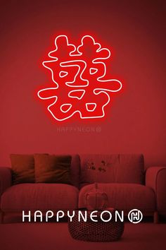 a living room with a red wall and a large neon sign that says happyneon