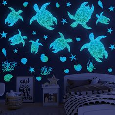 glow in the dark sea turtle and starfish wall decals set with blue background