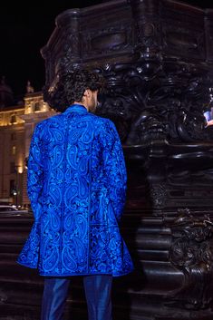 This set features thread embroidery in tones of blue. The ensemble is paired with a matching silk kurta and straight pants.From Seema Gujral's For the love of London collection. DELIVERY TIMEPlease allow 8-12 weeks for your outfit to arrive. FABRIC DETAILS Professional cleaning only. Designer Silk Sherwani Straight Kurta, Traditional Blue Sherwani For Diwali, Traditional Blue Sherwani With Pallu, Blue Formal Unstitched Suit With Traditional Drape, Blue Semi-stitched Sherwani For Diwali, Blue Embroidered Sherwani For Festivals, Blue Bollywood Sherwani For Diwali, Elegant Blue Nehru Jacket With Dabka Work, Embroidered Blue Sherwani For Festivals