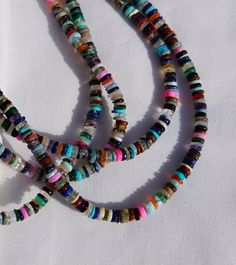 Each necklace is unique and every one different16-18" adjustable length Multi colored gemstones 14k Gold filled closure Do not wear this necklace in water for extended time(shower, pool, hot tub, beach) Colored Gemstones, Pool Hot Tub, In Water, Gemstone Colors, Gemstone Necklace, Multi Colored, Hot Tub, Gold Filled, Beaded Necklace