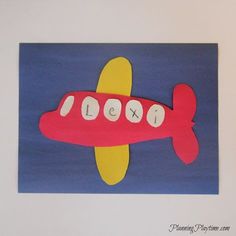 an airplane made out of paper with the word flexi on it's side