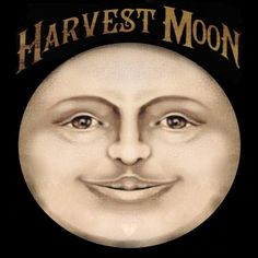 a close up of a face with the words harvest moon on it