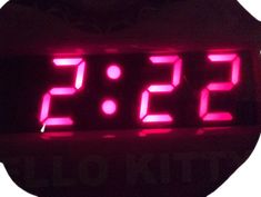 a digital clock with the time 535 on it's face is lit up