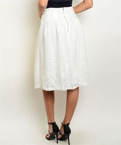 Fitted waist lace fit and flare midi skirt. Fabric Content: 100% PolyesterDescription: L: 27" W: 24" White Midi Skirt With Elastic Waistband, Knee-length Stretch White Skirt, White Relaxed A-line Skirt, White Relaxed Fit A-line Skirt, White Midi Skirt With Lace Trim, Flare Midi Skirt, White Midi Skirt, Midi Flare Skirt, Skirt Fabric