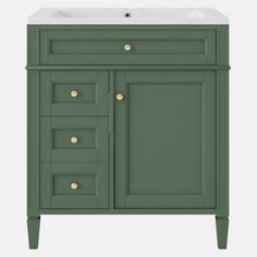 a bathroom vanity with drawers and a sink in green painted wood, against a white background