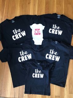 "\"The Crew\" Matching Family Shirts are perfect for welcoming the newest addition to your family. They make a great baby shower or baby sprinkle gift. Can be used for baby announcements and gender reveals! Can be made in any size and color. They are fully customizable so if you would like to alter the phrases or add something else, just ask! Include preferences in \"Message to Seller\" section when placing order. *Please message me for shipping adjustment if Etsy charges you shipping for EACH s Family Baby Shower Shirts, Matching Short Sleeve T-shirt For Family Events, Family Matching Short Sleeve Tops For Family Events, Cotton Crew Neck T-shirt For Family Events, Family Matching Cotton T-shirts For Family Events, Baby Shower Shirts For Family Design, Black Cotton Tops For Family Events, Customizable Fun Tops For Family, Matching Crew Neck Tops For Family Events