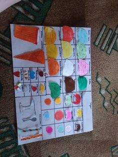 a child's handmade board game on the floor