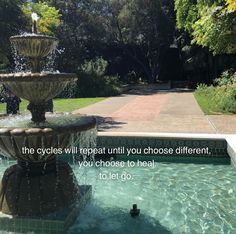 there is a fountain in the middle of a park with people walking around it and an inspirational quote about life