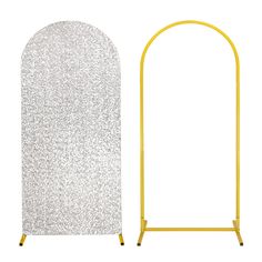 an ironing board next to a yellow stand with glitter fabric on it and a white background