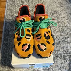 Adidas Nmd Hu X Pharrell Williams Color: Animal Print Like New, Worn Under A Handful Of Times* Also Have A Brand New Pair, Same Size, Ordered Accidentally, That Will Be In Another Listing Or Msg Me:) Size Us 5. Uk 4 1/2. Made In Vietnam. Created In Partnership With The Multi-Hyphenate Creative, The Pharrell X Adidas Nmd Human Race ‘Animal Print’ Dresses The Lifestyle Silhouette In Vibrant Hues Found In Nature. The Minimalist Upper Is Crafted From Orange Primeknit With Embroidered Leopard Spots I Multi Hyphenate, Leopard Spots, Adidas Nmd, Human Race, Pharrell Williams, The Lifestyle, Print Dresses, Animal Print Dresses, In Nature