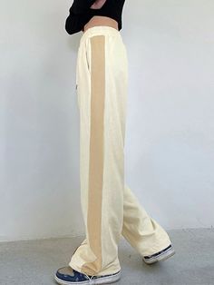 Side Contrast Panel Baggy Sweatpants Casual Cream Wide Leg Pants With Pockets, Sporty Wide Leg Cotton Pants, Sporty Baggy Wide Leg Pants, Sporty Baggy High-waisted Pants, Beige Full Length Athleisure Pants, Sporty High-waisted Baggy Pants, Sporty Wide-leg Cotton Pants, Casual Cream Bottoms With Side Pockets, Sporty Straight Pants For Leisure