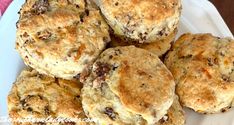 a white plate topped with lots of biscuits