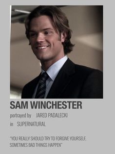 a man in a suit and tie smiling at the camera with an ad for sam winchester