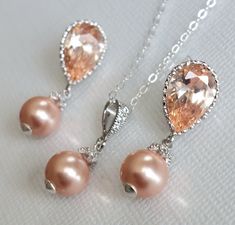 Peach Pearl Champagne Silver Earrings and Necklace Wedding Jewelry Set with .925 Sterling Silver Chain. PLEASE READ ITEM DESCRIPTION and SHOP POLICIES before placing your order, and contact me with any questions! EARRINGS are about 1.02 inch (2.6cm) long from top of earring stud to bottom. CHAIN is 18 inches (45.7cm) long. PENDANT is about 0.78 inch (2cm) long including bail. JEWELRY SETS SECTION: https://www.etsy.com/shop/LanaChayka?ref=seller-platform-mcnav§ion_id=18873488 BRIDAL JEWELRY SETS Champagne Jewelry Set, Peach Champagne Wedding, Peach Jewellery Set, Peach Pearl Jewelry For Gift, Elegant Peach Earrings For Wedding, Elegant Peach Pearl Jewelry, Champagne Jewelry, Pearl Wedding Jewelry Sets, Bridal Jewelry Pearl Sets