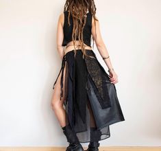 Long black and gold split skirt with tie closure. It is decorated with fabric braids and lace. Free size Measurements: Front length: 74 cm / 29" Black length: 87 cm / 34.2" Hips should not be smaller than 78 cm / 30.7"   ⚛View all skirts from my shop⚛ https://www.etsy.com/shop/inespu?section_id=33224303 - - - - - - - - - - - - - - - - - - - - - - - - - - - - - - - - - - - - - - - - - - - -    Thank you so much for visiting! 💚 You are welcome to check out other items in my shop  https://www.etsy Fabric Braids, Metal Skirt, Elven Forest, Forest Festival, Festival Belt, Belt Skirt, Fashion Grunge, Dance Pants, Split Skirt