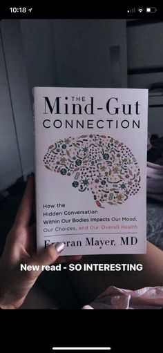 the mind - gutt connection book is in someone's hand