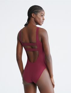 Compressive Leotard For Swimming, Compressive Swimming Leotard, Sporty Scoop Neck Swimwear In Nylon, Scoop Back Swimwear With Minimal Stretch, Scoop Back Swimwear With Moderate Coverage, Solid Color Scoop Neck Swimwear With Minimal Stretch, Sporty Solid Color Scoop Neck Swimwear, Minimal Stretch Scoop Neck Swimwear, Sporty Scoop Neck Swimwear Bodysuit