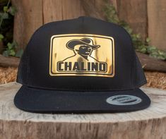 new Chalino Sanchez embroidered patch hat Gold Adjustable Flat Brim Trucker Hat, Gold Snapback Trucker Hat, Black Trucker Hat With Embroidered Patch, Chalino Sanchez Shirt, Black Snapback Hat With Patches, Black Snapback Hat With Embroidered Patch, Chalino Sanchez, Black 5-panel Snapback Hat With Embroidered Logo, Patch Hat