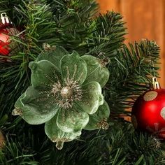 a christmas tree with ornaments hanging from it