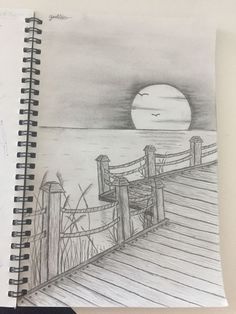 a pencil drawing of a pier with the sun setting in the distance and water behind it