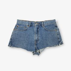 "Gender:Womens  Vintage Levi's 505 cut off denim hot pants in mid blue with a zip fly. Measures size W34. Made from cotton.  Condition:Excellent    Measurements:     Waist: 34\"   Leg Length: 1\"" Levi's Mid-rise Blue Shorts, Levi's Mid-rise Denim Blue Shorts, Levi's Cutoff Denim Blue Shorts, Levi's Denim Blue Cutoff Shorts, Vintage Mid-rise Denim Blue Shorts, Denim Scraps, Vintage Calvin Klein, Levis 505, Levi’s 501