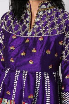 Purple peplum top with hand-embroidered floral motifs with scalloped hem. Paired with lehenga with camel motifs embroidery
Component: 2
Pattern: Embroidered
Type Of Work: Camel Motifs
Neckline: Mandarin Collar
Sleeve Type: Three Quarter
Fabric: Silk
Color: Purple
Other Details: 
Scalloped hem top
Asymmetric top
Occasion: Destination Wedding - Aza Fashions Fitted Embroidered Top With Motifs For Festive Season, Purple Anarkali Set With Embroidered Border, Fitted Multicolor Embroidered Top For Festive Occasions, Fitted Embroidered Top With Multicolor Embroidery For Festive Occasions, Traditional Fitted Embroidered Top With Embroidered Border, Fitted Traditional Embroidered Top With Embroidered Border, Fitted Traditional Embroidered Top, Fitted Sets With Embroidered Border For Festive Occasion, Festive Embroidered Top With Multicolor Embroidery