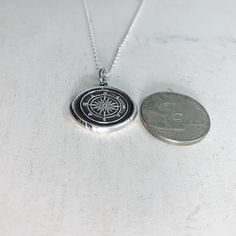 "Do you love to travel? This handmade silver charm is perfect for those who love adventure! The pendant measures approximately 3/4\" and is made from .999 fine (pure) silver. Each pendant is handmade by me in a multiple step process until it becomes a pendant that resembles the old fashioned wax seals found on vintage envelopes. Every pendant will be unique and have its very own \"personality\". I believe in perfect imperfections, so the way it comes out of the batch is how it is meant to be. I Silver Compass Necklace, Compass Necklace Silver, Wax Seal Pendant, Seal Necklace, Wax Seal Necklace, Travel Necklace, Compass Necklace, Wax Seal, Necklace Vintage