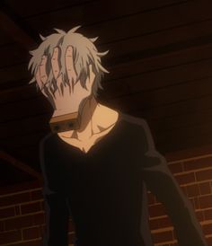 an anime character with white hair and black shirt standing in front of a brick wall