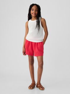 Soft knit shorts.  Elasticized waist.  Mid rise.  Easy pull-on waist. Gap Shorts With Elastic Waistband, Gap Casual Shorts With Elastic Waistband, Gap Stretch Shorts With Elastic Waistband, Gap Summer Shorts With Elastic Waistband, Gap Pink Shorts, Gap Bottoms With Elastic Waistband For Summer, Gap Summer Bottoms For Beach, Gap High-waisted Summer Shorts, Gap Summer Beach Bottoms