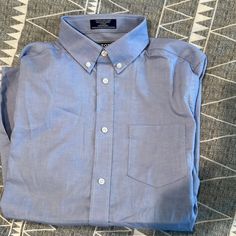 Brand New With Tags Boys Izod Collared Dress Shirt. Size Large /14-16. Button Up Light Blue. Blue Cotton Dress Shirt With Pockets, Casual Short Sleeve Dress Shirt For Daywear, Light Blue Cotton Dress Shirt With Button Closure, Casual Light Blue Short Sleeve Dress Shirt, Blue Dress Shirt With Button Closure For Daywear, Casual Blue Dress Shirt For Daywear, Classic Light Blue Short Sleeve Dress Shirt, Collared Dress, Boys Top