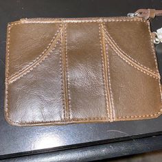 Brown Liz Claiborne Wallet With Wrist Handle, Brand New Never Used Brown Rectangular Coin Purse With Zipper Closure, Brown Bifold Clutch With Zipper Closure, Brown Zipper Closure Clutch Coin Purse, Leather Wristlet With Zipper Pouch For Daily Use, Brown Everyday Wristlet With Card Slots, Brown Wristlet With Card Slots For Daily Use, Brown Wristlet With Card Slots For Everyday, Casual Everyday Wristlet With Zipper Pouch, Casual Wristlet With Zipper Pouch For Everyday Use