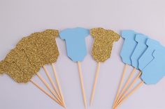 blue and gold cupcake toppers on sticks