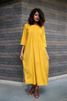 "Mustard Maxi Dress, Pin tucks Dress, Linen Maxi Dress, Made to Order, Custom Made, Plus Size - Model height: 5'3\" wearing size S - Length: 46\" - Fit: Loose - Pin tucks on front - Chain stitch embroidery in between Add a belt to your outfit and define your waistline to make it smart-wear! (Belt is not included in this listing)" Yellow Pleated Dress For Daywear, Long Sleeve Cotton Dress With Pintucks, Cotton Long Sleeve Dress With Pintucks, Casual Cotton Dress With Pintucks, Pin Tucks Dress, Tuck Dress, Bohemian Pants, Chain Stitch Embroidery, Dress Linen