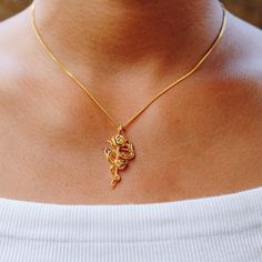 24K Gold Plated Snake and Rose pendant necklace. The rose and snake design are the ultimate symbol of temptation. They also represent loss of innocence and beauty. Chain length 16 inches / 40.6 cm 18 inches / 45.7 cm 23.5 inches / 60 cm 31.5 inches / 80 cm Available in 925 Sterling Silver https://etsy.me/35Q2gAy Every piece is handcrafted in Bali and made with Intention, Love, and Soul so that it can be felt by its wearer and ultimately change our energy and lives in a positive way. Each with it Rose Sculpture, Chain And Pendant, Hand Sculpture, Snake Design, Rose Pendant, Rose Necklace, Chain Design, 925 Sterling Silver Chain, Jewelry Inspo