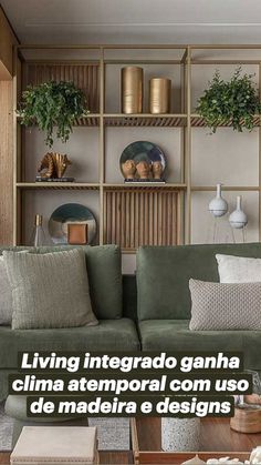 a living room filled with lots of furniture next to a wooden shelf covered in plants