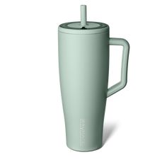 a green cup with a handle on it