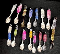 there are many spoons that have different colors on them, and one is empty