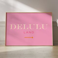 a pink poster with the words deleuu land on it