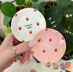 These strawberry dishes are painted by hand, the perfect cute dish to home your everyday jewellery and essentials. Handmade from air dry clay. Hand-painted with acrylic paints and sealed with a super smooth glossy finish for a ceramic-look. All designs are painted by hand, without a stencil, making them unique and special for your own home or to gift to friends and family. SIZE Approx. 3 inches wide  0.5 inches tall PERSONALISATION - any personalisation will be painted in the middle of the dish Strawberry Plate, Strawberry Ceramic, Stencil Making, Strawberry Dishes, Clay Painting, Pink Dishes, Light Baby Pink, Painted Bowl, Diy Pottery Painting