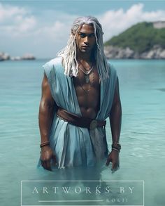 a man with long white hair standing in the ocean wearing a blue dress and necklace