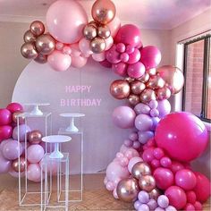 balloons are arranged in the shape of an arch for a birthday party or special event