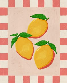 two oranges on a checkered tablecloth with green leaves and one is yellow